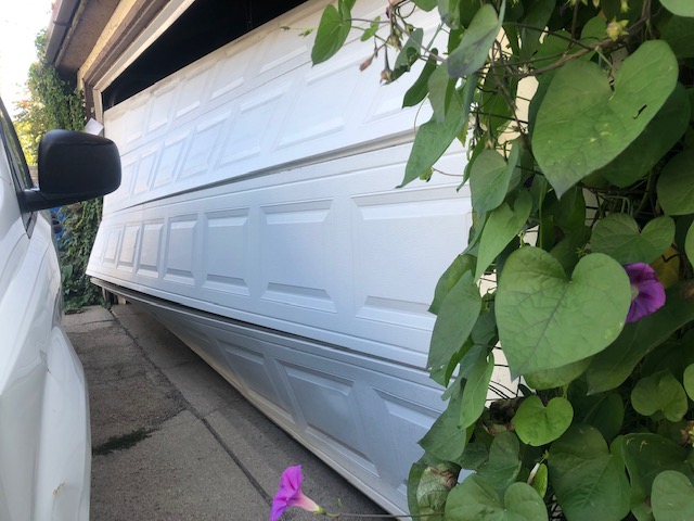 chicago garage door repair, garage door chicago, damaged panel